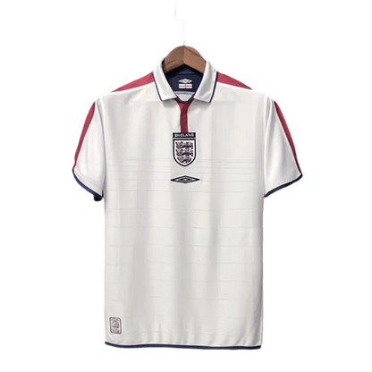https://cdn.shopify.com/s/files/1/0826/7228/8075/files/2004-england-home-retro-kit-748732.webp?v=1741196961
