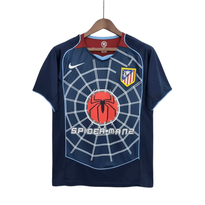 https://cdn.shopify.com/s/files/1/0826/7228/8075/files/20042005-atletico-madrid-spider-man-2-away-retro-kit-classickits433-412864.webp?v=1741198276