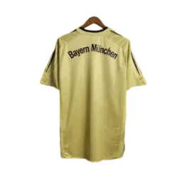 https://cdn.shopify.com/s/files/1/0826/7228/8075/files/20042005-bayern-munich-t-com-away-retro-kit-classickits433-128093.webp?v=1741197754