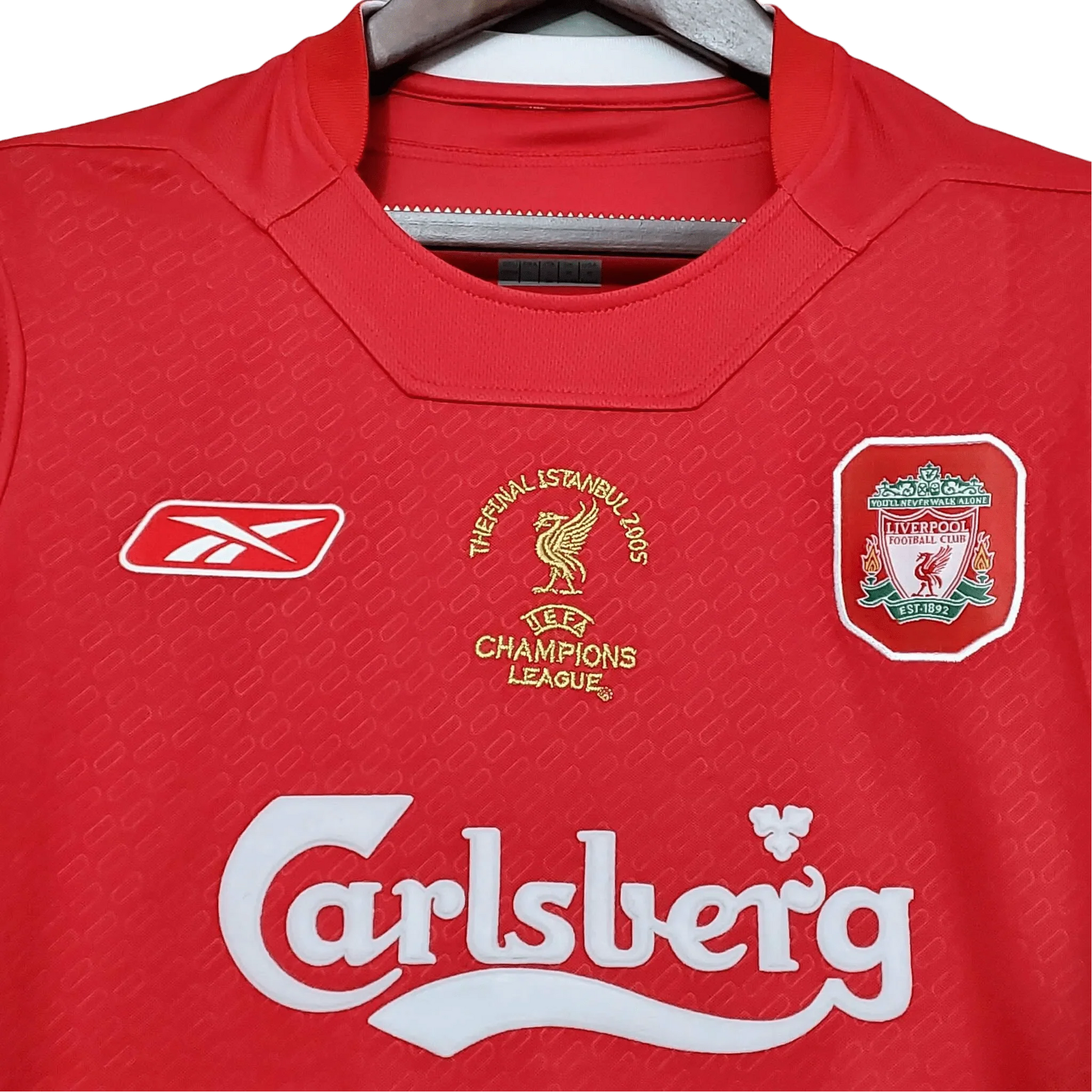 https://cdn.shopify.com/s/files/1/0826/7228/8075/files/20042005-liverpooi-carlsberg-ucl-final-istanbul-home-retro-kit-classickits433-839941.webp?v=1741198015