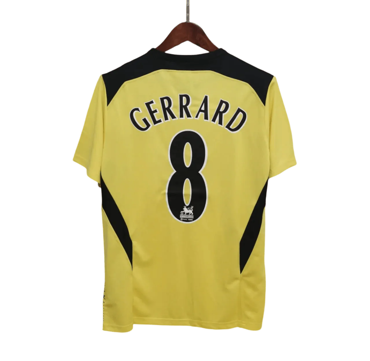 https://cdn.shopify.com/s/files/1/0826/7228/8075/files/20042005-liverpooi-carlsberg-yellow-away-retro-kit-classickits433-581118.webp?v=1741197876