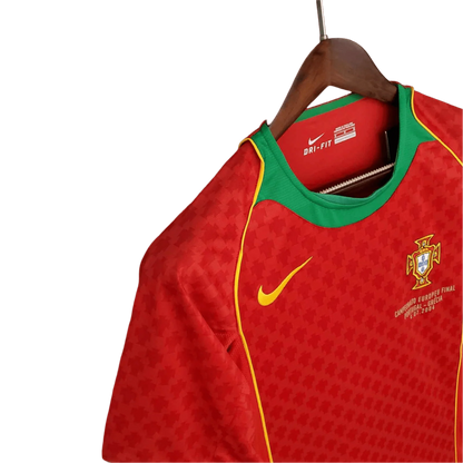 https://cdn.shopify.com/s/files/1/0826/7228/8075/files/20042005-portugal-home-retro-jersey-466043.webp?v=1741198528