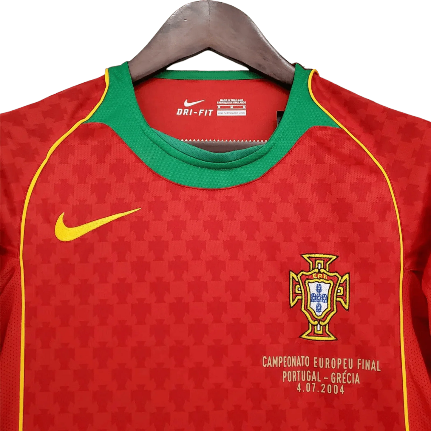 https://cdn.shopify.com/s/files/1/0826/7228/8075/files/20042005-portugal-home-retro-jersey-840696.webp?v=1741198530