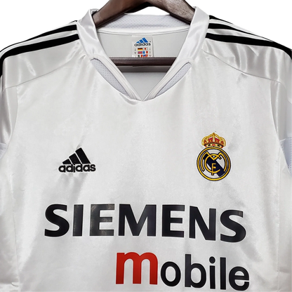 https://cdn.shopify.com/s/files/1/0826/7228/8075/files/20042005-real-madrid-siemens-mobile-home-retro-kit-364205.webp?v=1741197483