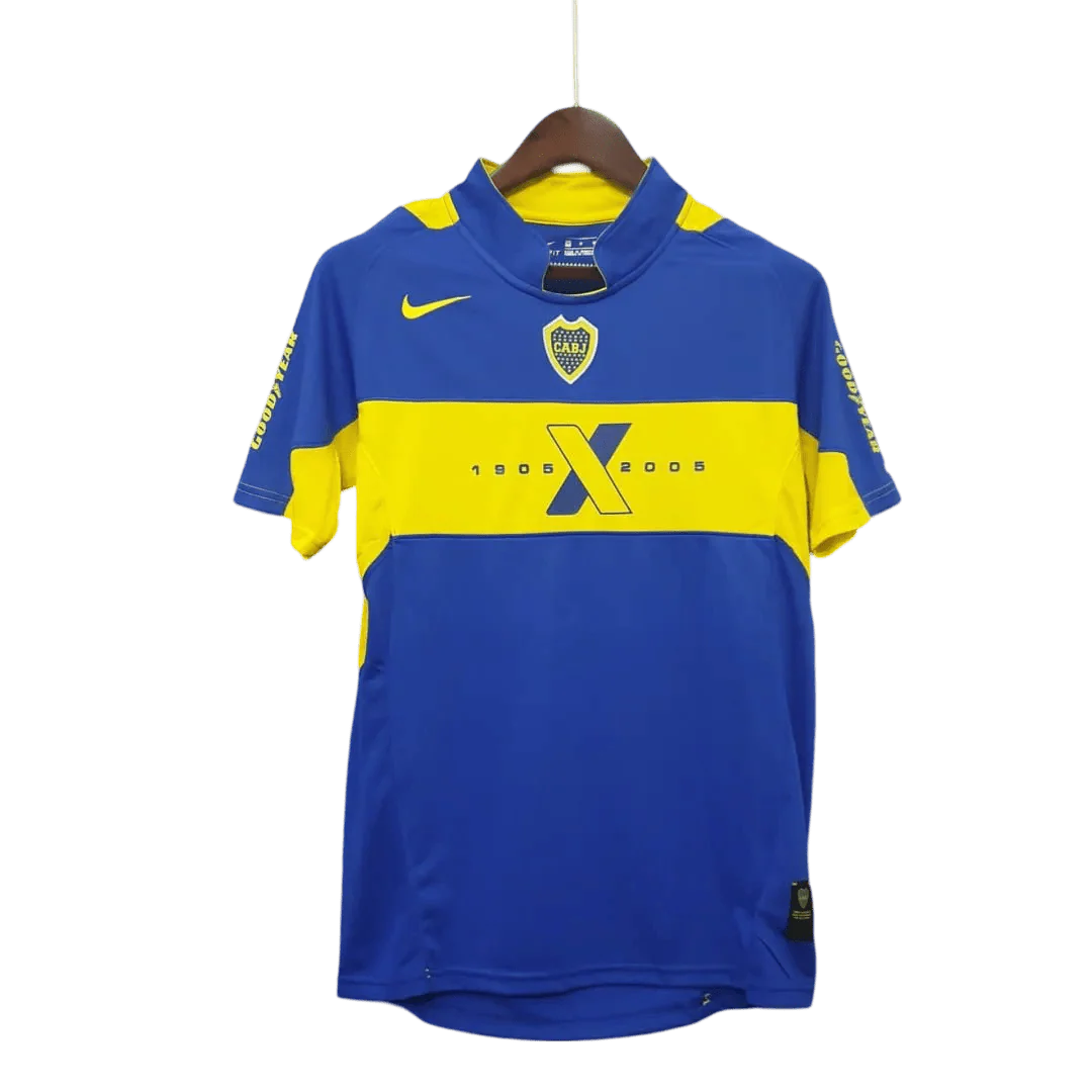 https://cdn.shopify.com/s/files/1/0826/7228/8075/files/2005-boca-juniors-home-retro-jersey-440262.webp?v=1741197156