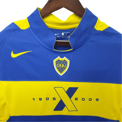 https://cdn.shopify.com/s/files/1/0826/7228/8075/files/2005-boca-juniors-home-retro-jersey-450406.webp?v=1741197156