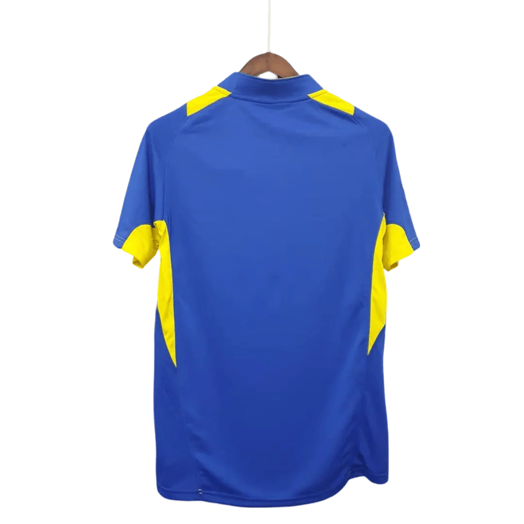 https://cdn.shopify.com/s/files/1/0826/7228/8075/files/2005-boca-juniors-home-retro-jersey-926149.webp?v=1741197157