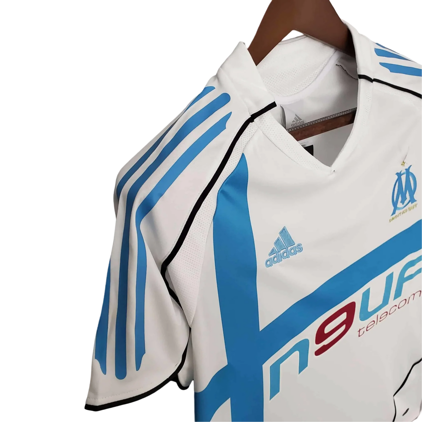 https://cdn.shopify.com/s/files/1/0826/7228/8075/files/20052006-olympique-de-marseille-n9uf-telecom-home-retro-jersey-432812.webp?v=1741198011