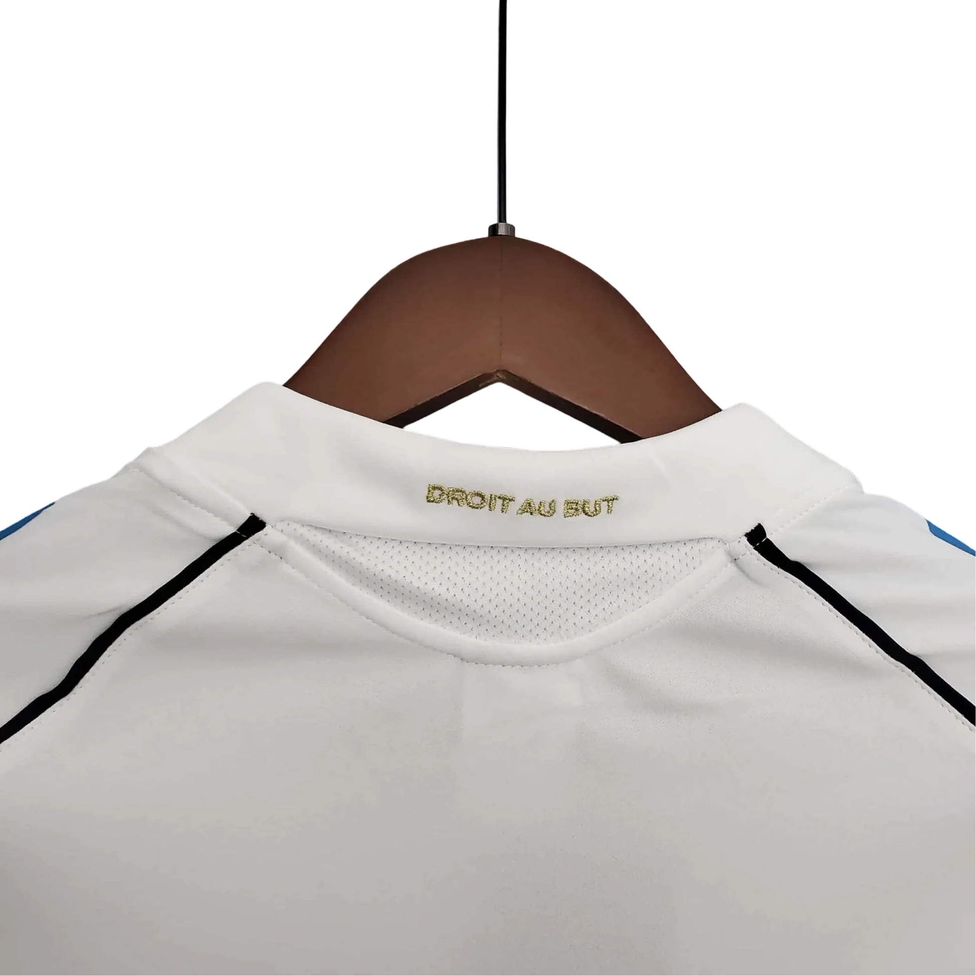 https://cdn.shopify.com/s/files/1/0826/7228/8075/files/20052006-olympique-de-marseille-n9uf-telecom-home-retro-jersey-946230.webp?v=1741198011