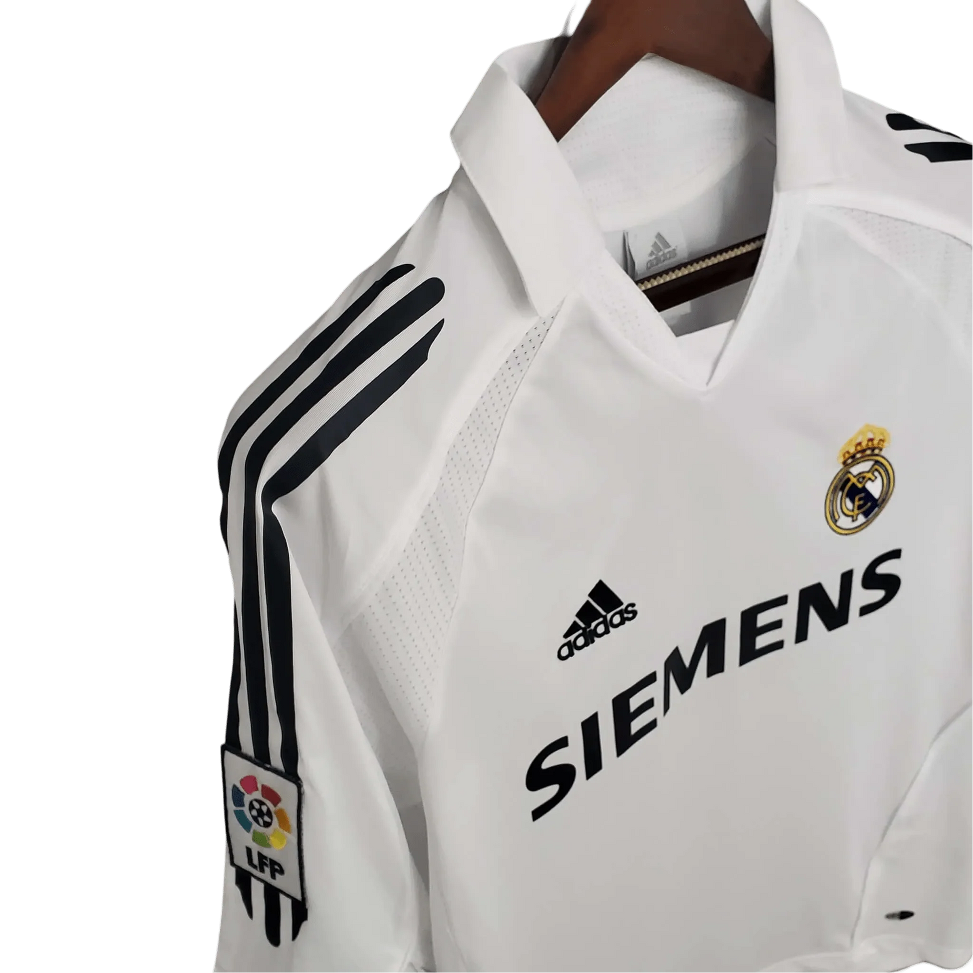 https://cdn.shopify.com/s/files/1/0826/7228/8075/files/20052006-real-madrid-siemens-home-retro-kit-short-sleeves-998529.webp?v=1741197435