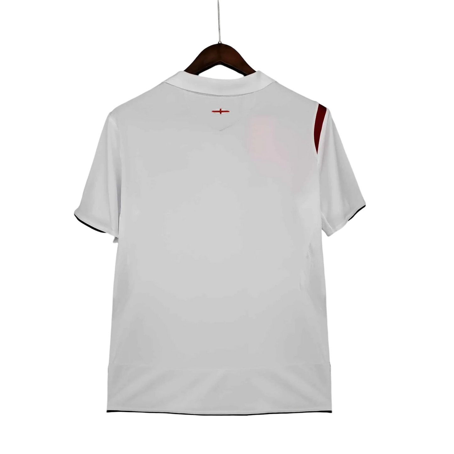 https://cdn.shopify.com/s/files/1/0826/7228/8075/files/20052007-england-home-retro-kit-553688.webp?v=1741197039