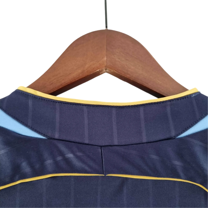 https://cdn.shopify.com/s/files/1/0826/7228/8075/files/2006-argentina-away-retro-kit-832731.webp?v=1741197280