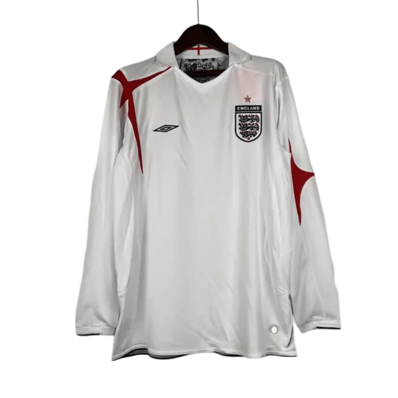 https://cdn.shopify.com/s/files/1/0826/7228/8075/files/2006-england-home-retro-kit-long-sleeves-616320.webp?v=1741196949