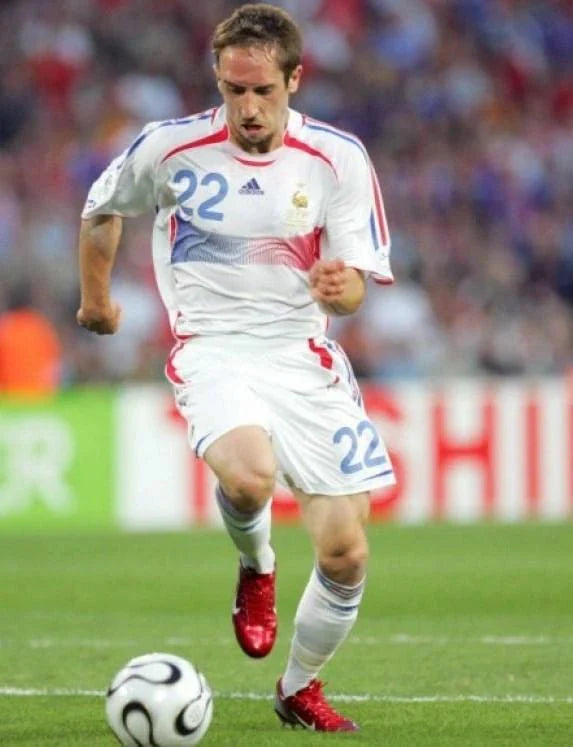 https://cdn.shopify.com/s/files/1/0826/7228/8075/files/2006-france-world-cup-away-retro-jersey-147450.webp?v=1741198592
