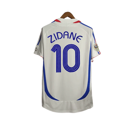 https://cdn.shopify.com/s/files/1/0826/7228/8075/files/2006-france-world-cup-away-retro-jersey-265206.webp?v=1741198594