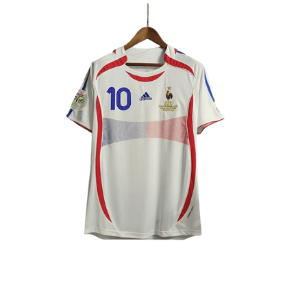 https://cdn.shopify.com/s/files/1/0826/7228/8075/files/2006-france-world-cup-away-retro-jersey-443961.webp?v=1741198594