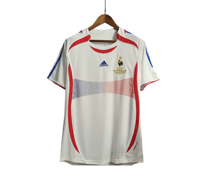 https://cdn.shopify.com/s/files/1/0826/7228/8075/files/2006-france-world-cup-away-retro-jersey-499965.webp?v=1741198593