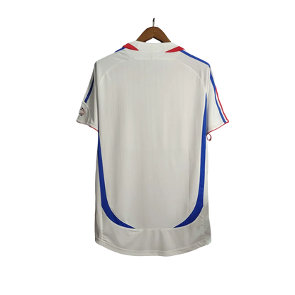 https://cdn.shopify.com/s/files/1/0826/7228/8075/files/2006-france-world-cup-away-retro-jersey-514548.webp?v=1741198593