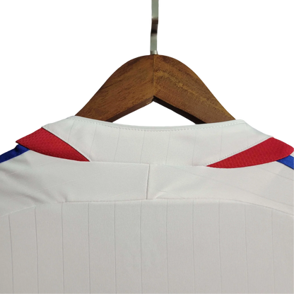 https://cdn.shopify.com/s/files/1/0826/7228/8075/files/2006-france-world-cup-away-retro-jersey-587939.webp?v=1741198594