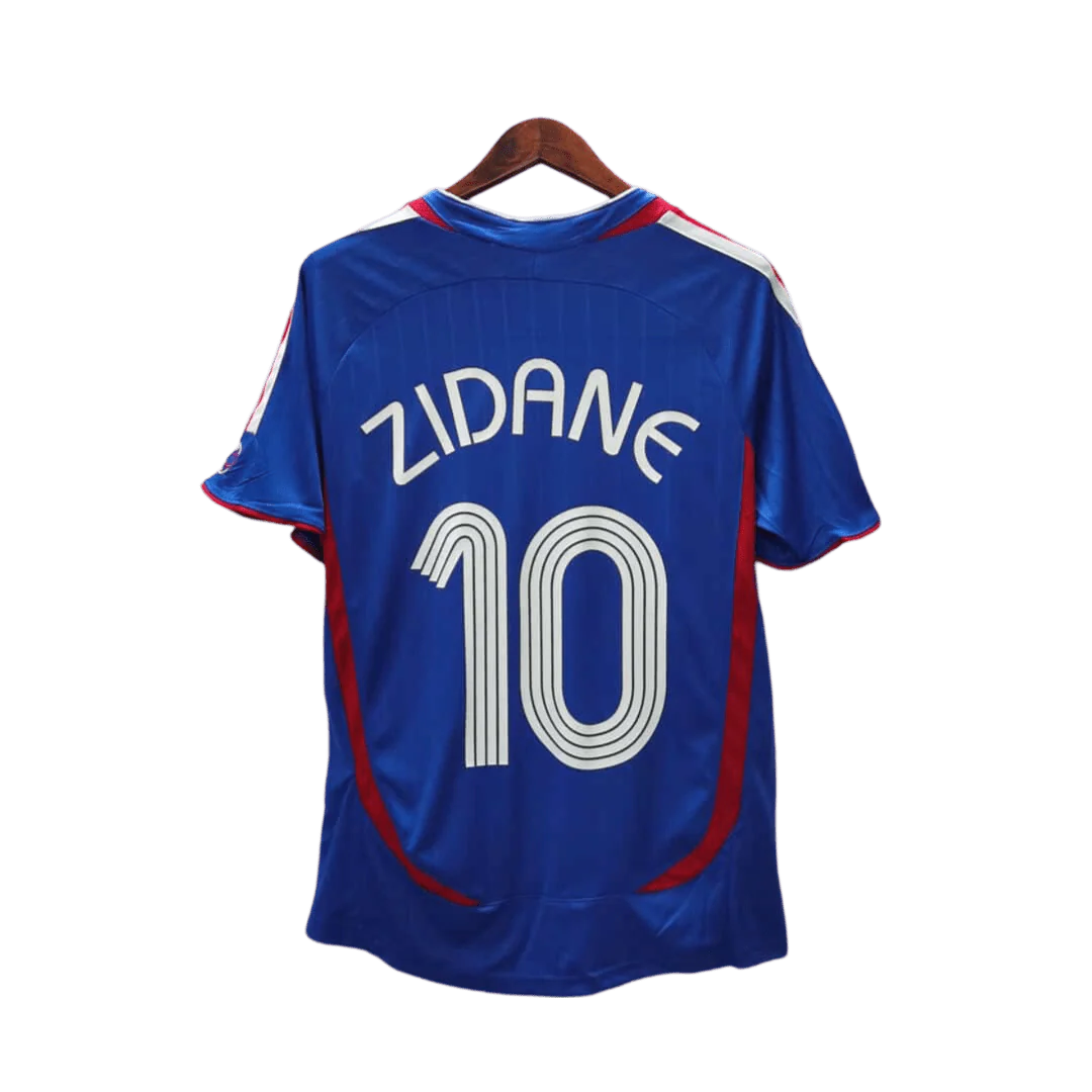 https://cdn.shopify.com/s/files/1/0826/7228/8075/files/2006-france-world-cup-home-retro-jersey-235085.webp?v=1741198514