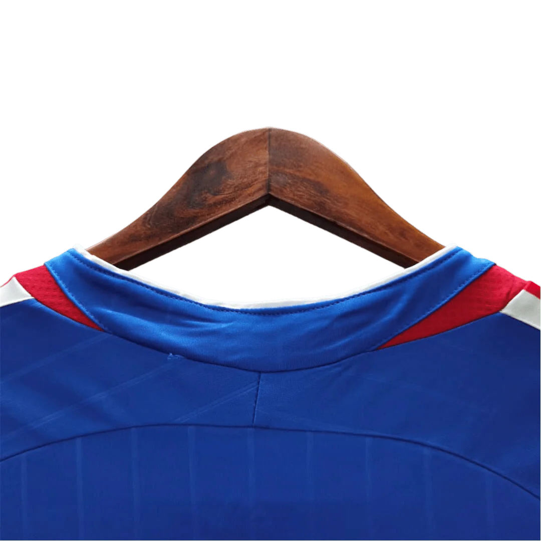 https://cdn.shopify.com/s/files/1/0826/7228/8075/files/2006-france-world-cup-home-retro-jersey-659558.webp?v=1741198514