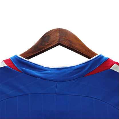 https://cdn.shopify.com/s/files/1/0826/7228/8075/files/2006-france-world-cup-home-retro-jersey-659558.webp?v=1741198514