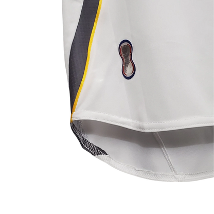 https://cdn.shopify.com/s/files/1/0826/7228/8075/files/2006-japan-away-retro-kit-391134.webp?v=1741197172