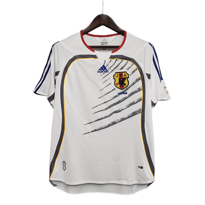 https://cdn.shopify.com/s/files/1/0826/7228/8075/files/2006-japan-away-retro-kit-411679.webp?v=1741197170