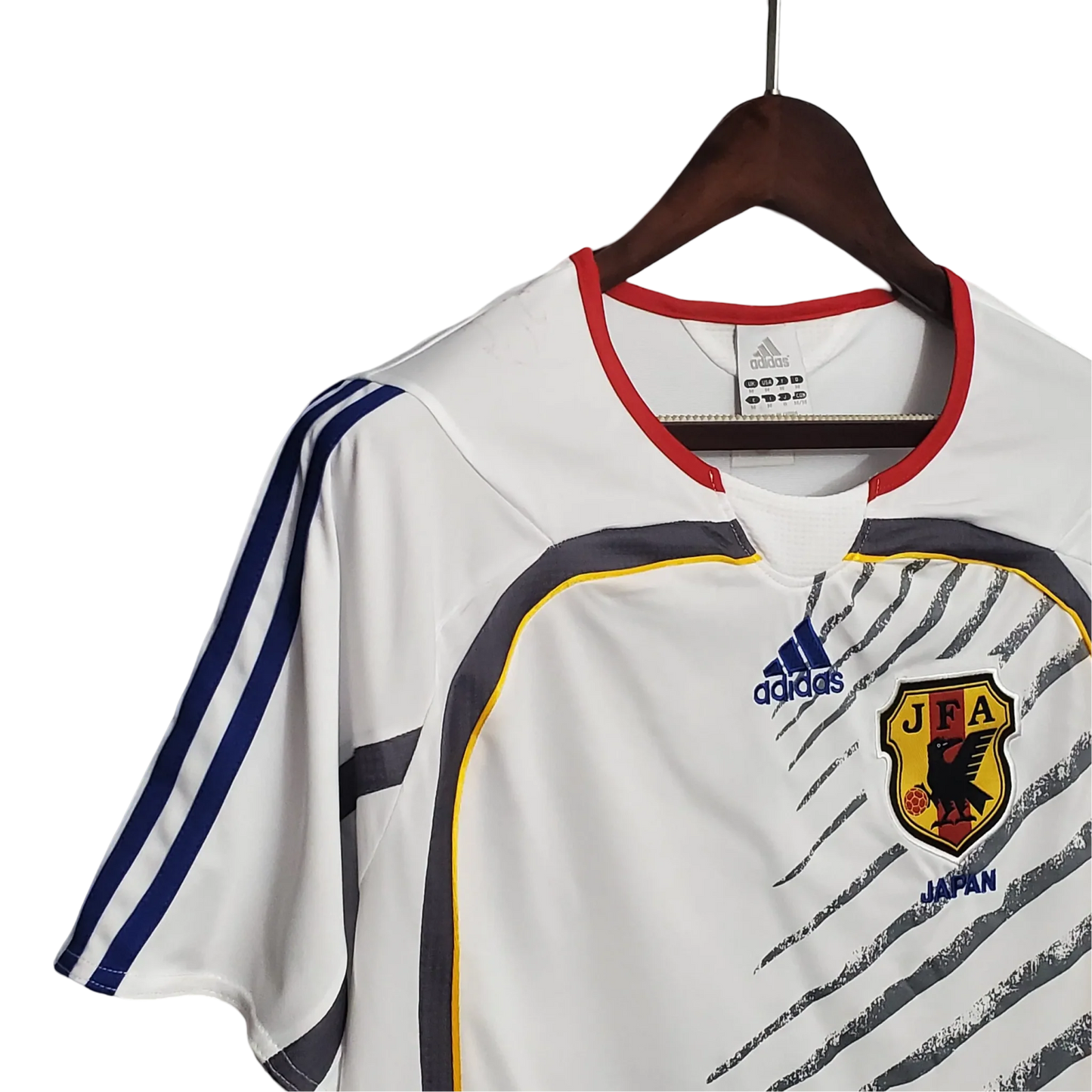 https://cdn.shopify.com/s/files/1/0826/7228/8075/files/2006-japan-away-retro-kit-549865.webp?v=1741197170