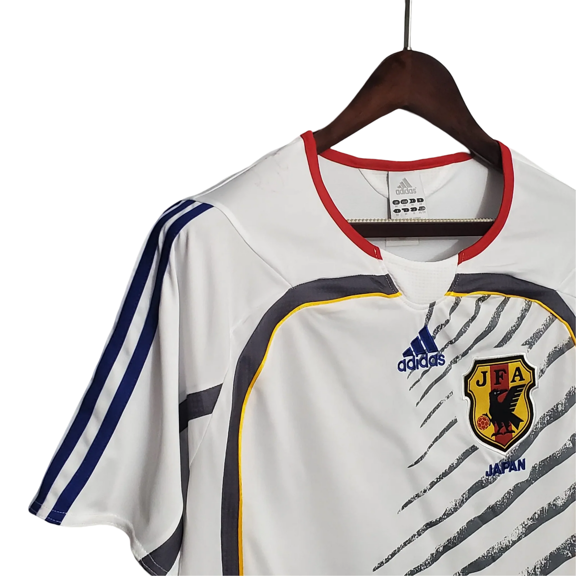 https://cdn.shopify.com/s/files/1/0826/7228/8075/files/2006-japan-away-retro-kit-549865.webp?v=1741197170