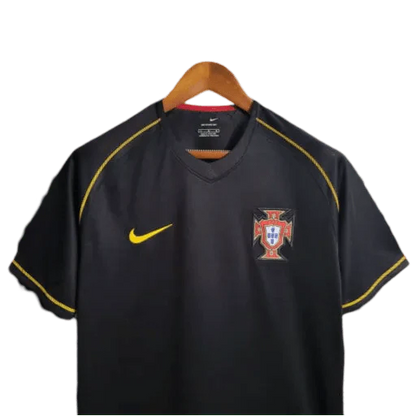 https://cdn.shopify.com/s/files/1/0826/7228/8075/files/2006-portugal-away-retro-kit-114589.webp?v=1741197034