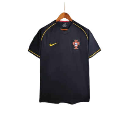 https://cdn.shopify.com/s/files/1/0826/7228/8075/files/2006-portugal-away-retro-kit-332149.webp?v=1741197032