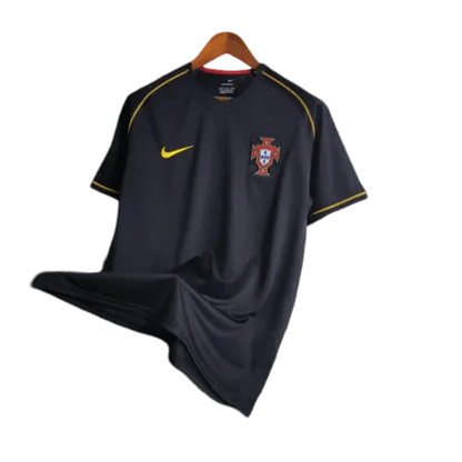 https://cdn.shopify.com/s/files/1/0826/7228/8075/files/2006-portugal-away-retro-kit-537226.webp?v=1741197032