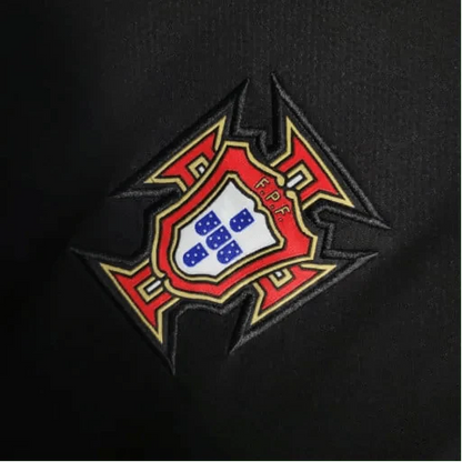https://cdn.shopify.com/s/files/1/0826/7228/8075/files/2006-portugal-away-retro-kit-671440.webp?v=1741197034