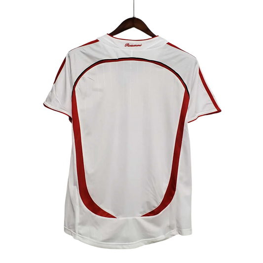 https://cdn.shopify.com/s/files/1/0826/7228/8075/files/20062007-ac-milan-bwin-away-retro-kit-short-sleeve-193589.webp?v=1741197303