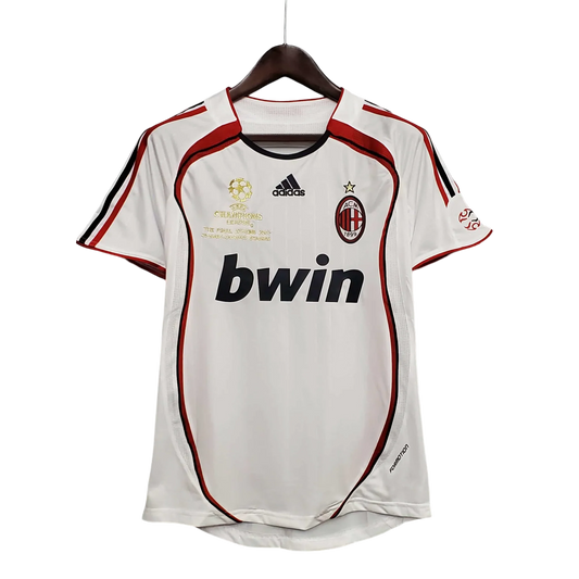 https://cdn.shopify.com/s/files/1/0826/7228/8075/files/20062007-ac-milan-bwin-away-retro-kit-short-sleeve-811289.webp?v=1741197306