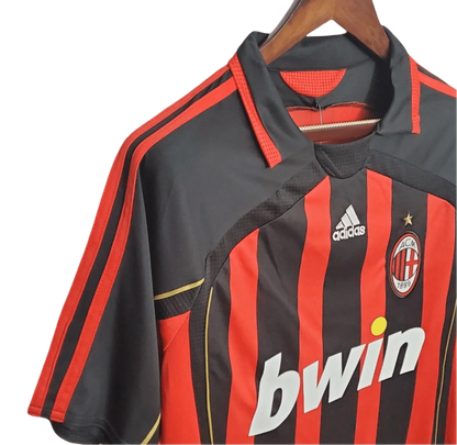 https://cdn.shopify.com/s/files/1/0826/7228/8075/files/20062007-ac-milan-bwin-home-retro-kit-govintagejersey-270185.webp?v=1741198901
