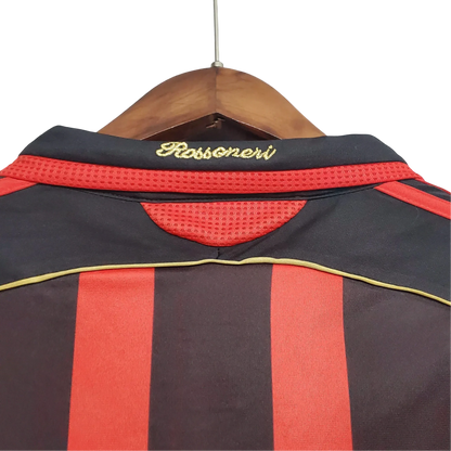 https://cdn.shopify.com/s/files/1/0826/7228/8075/files/20062007-ac-milan-bwin-home-retro-kit-govintagejersey-801450.webp?v=1741198901