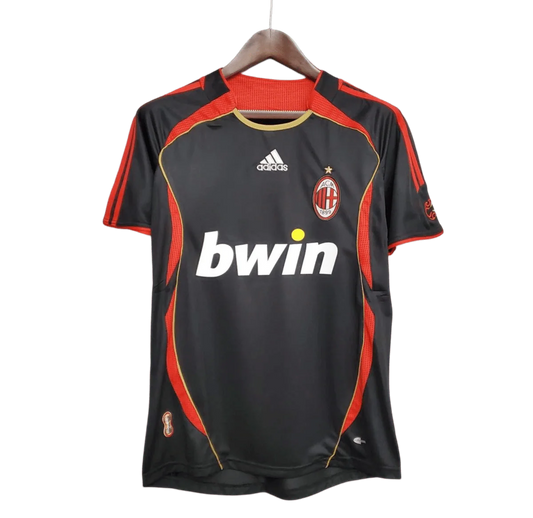 https://cdn.shopify.com/s/files/1/0826/7228/8075/files/20062007-ac-milan-bwin-third-retro-kit-classickits433-412946.webp?v=1741198842