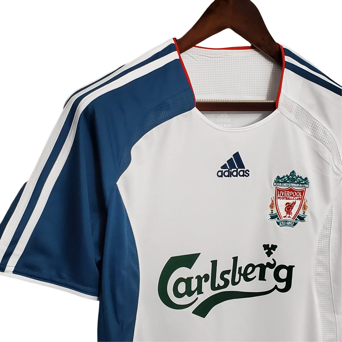 https://cdn.shopify.com/s/files/1/0826/7228/8075/files/20062007-liverpooi-carlsberg-away-retro-kit-classickits433-481938.webp?v=1741198017