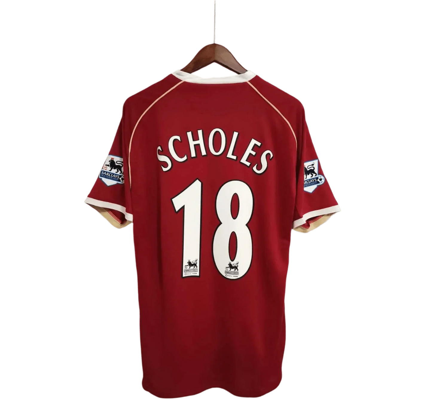 https://cdn.shopify.com/s/files/1/0826/7228/8075/files/20062007-manchester-united-aig-home-retro-kit-short-sleeves-classickits433-464042.webp?v=1741197749