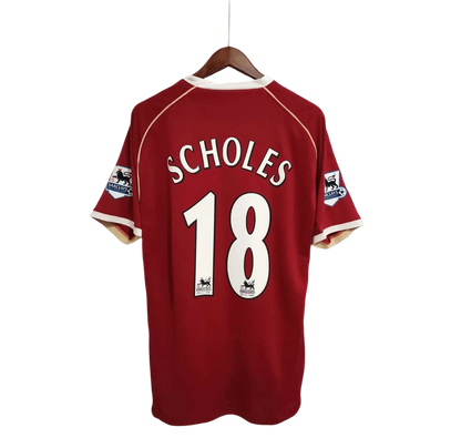 https://cdn.shopify.com/s/files/1/0826/7228/8075/files/20062007-manchester-united-aig-home-retro-kit-short-sleeves-classickits433-464042.webp?v=1741197749