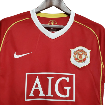 https://cdn.shopify.com/s/files/1/0826/7228/8075/files/20062007-manchester-united-aig-home-retro-kit-short-sleeves-classickits433-483560.webp?v=1741197751