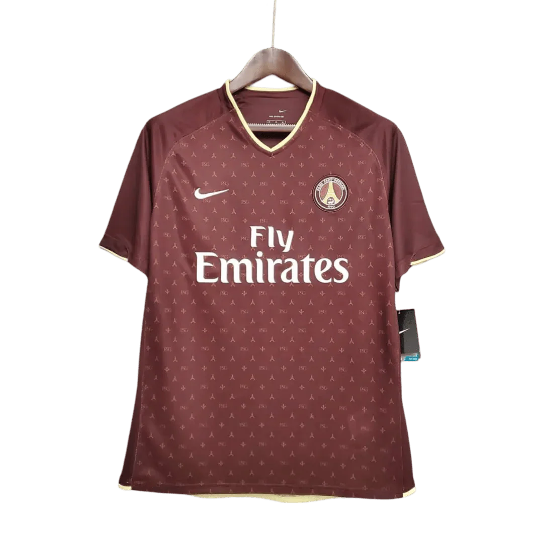https://cdn.shopify.com/s/files/1/0826/7228/8075/files/20062007-paris-saint-germain-fly-emirates-away-red-retro-jersey-778590.webp?v=1741197866