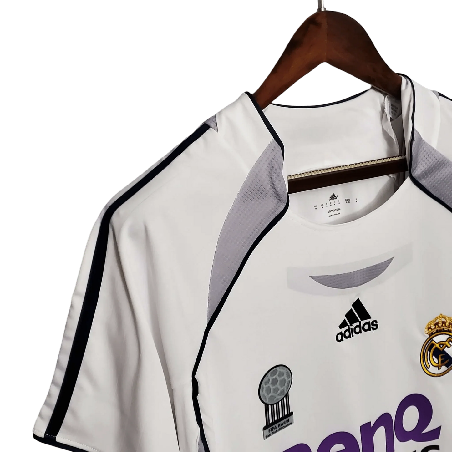 https://cdn.shopify.com/s/files/1/0826/7228/8075/files/20062007-real-madrid-benq-siemens-home-retro-kit-703635.webp?v=1741197460