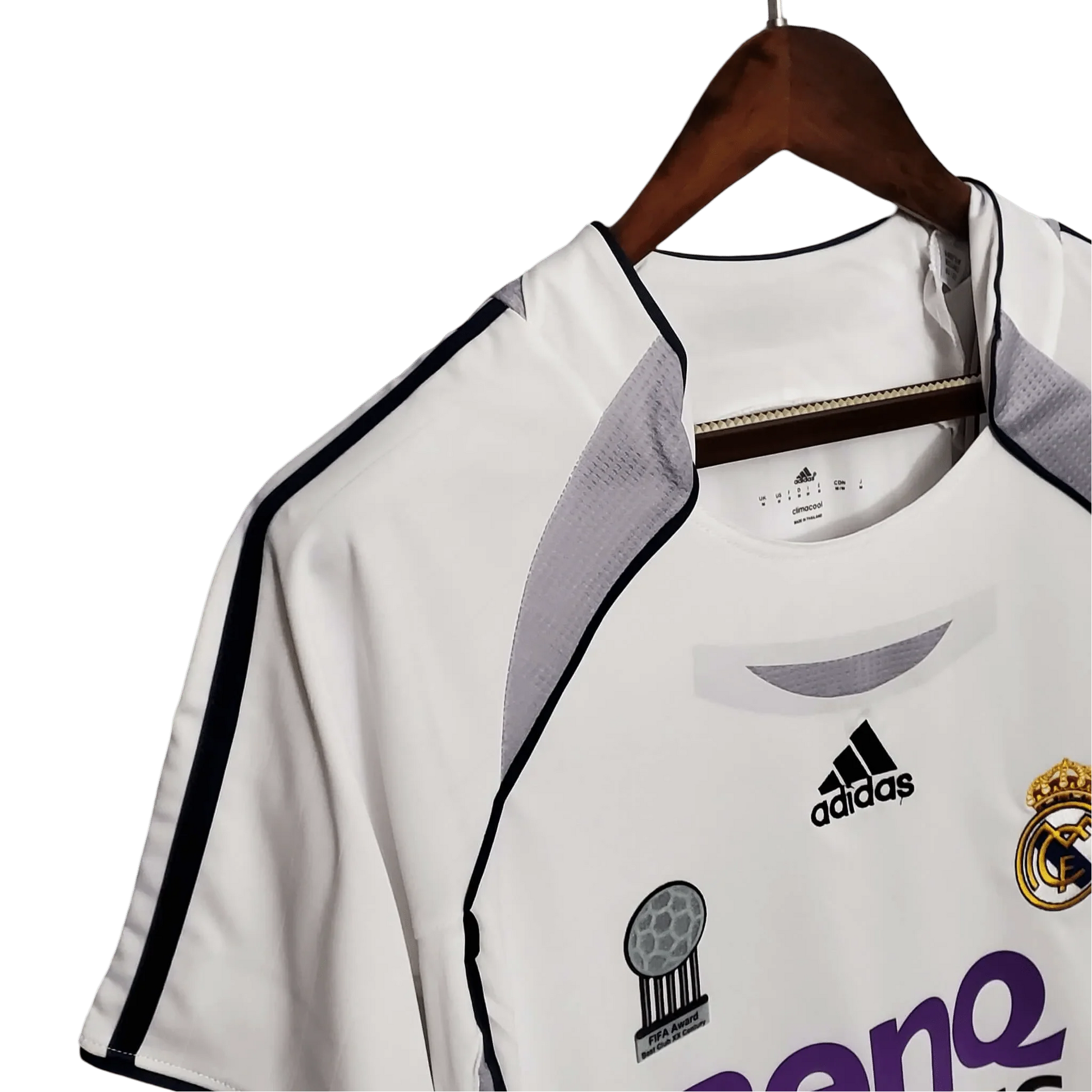 https://cdn.shopify.com/s/files/1/0826/7228/8075/files/20062007-real-madrid-benq-siemens-home-retro-kit-703635.webp?v=1741197460