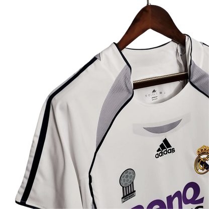 https://cdn.shopify.com/s/files/1/0826/7228/8075/files/20062007-real-madrid-benq-siemens-home-retro-kit-703635.webp?v=1741197460