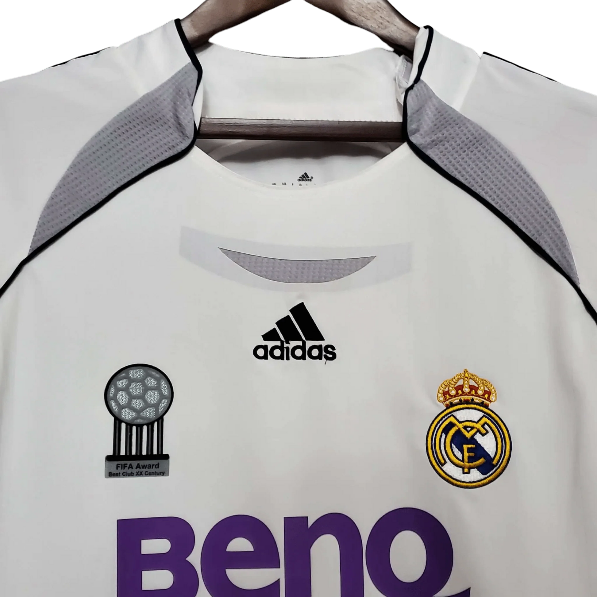 https://cdn.shopify.com/s/files/1/0826/7228/8075/files/20062007-real-madrid-benq-siemens-home-retro-kit-729994.webp?v=1741197461