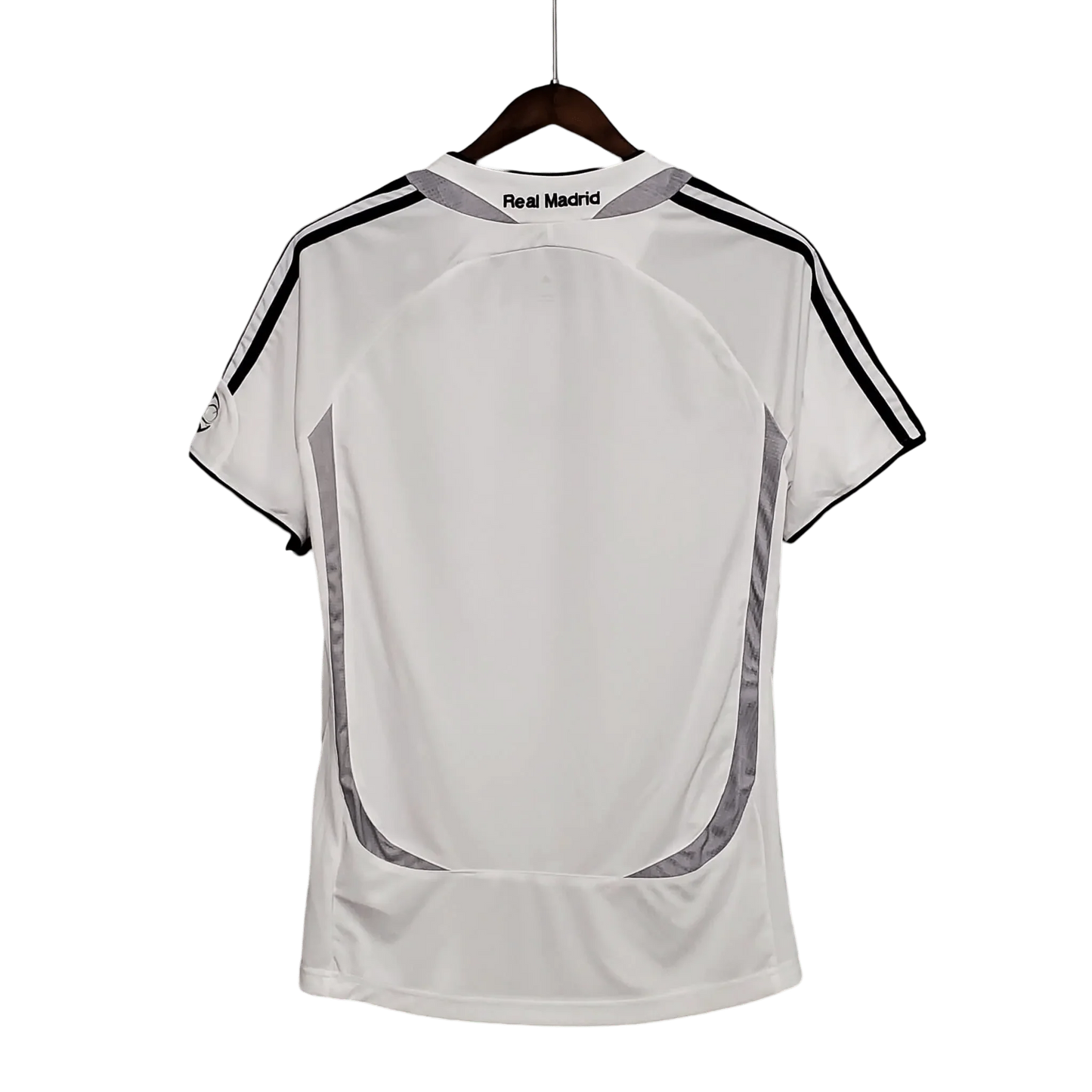 https://cdn.shopify.com/s/files/1/0826/7228/8075/files/20062007-real-madrid-benq-siemens-home-retro-kit-814867.webp?v=1741197460