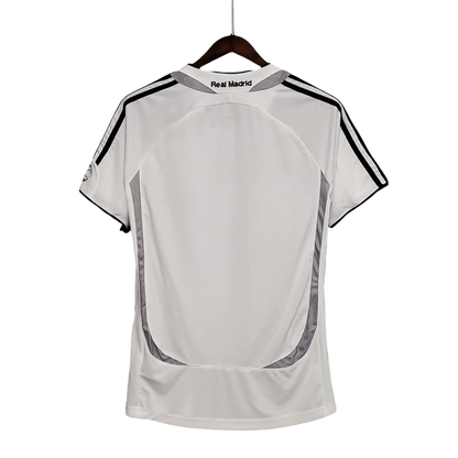 https://cdn.shopify.com/s/files/1/0826/7228/8075/files/20062007-real-madrid-benq-siemens-home-retro-kit-814867.webp?v=1741197460